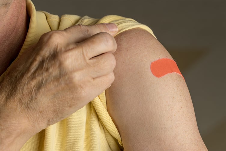 Bandaid on arm from flushot